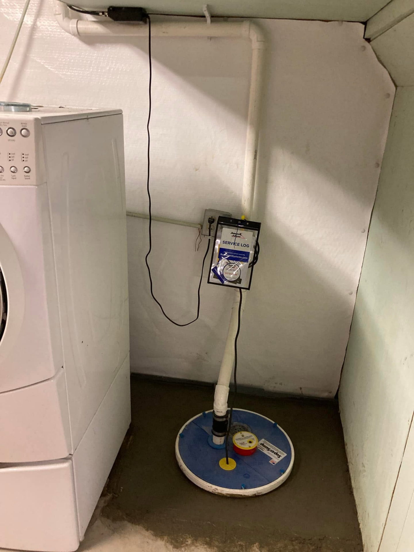 Sump pump system installed in a dry basement
