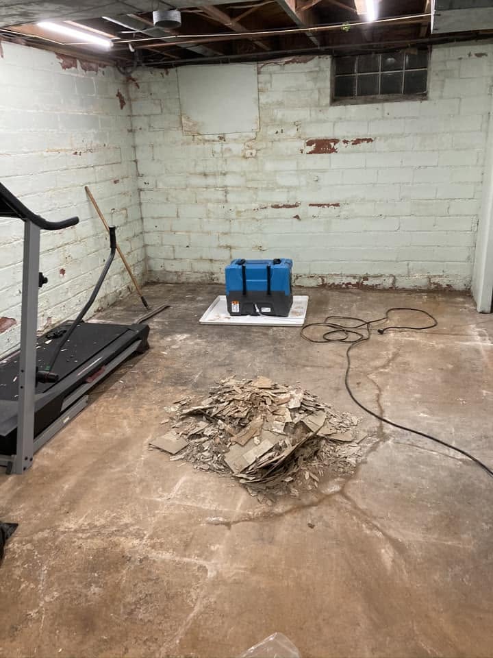Basement drying with commercial air scrubber equipment