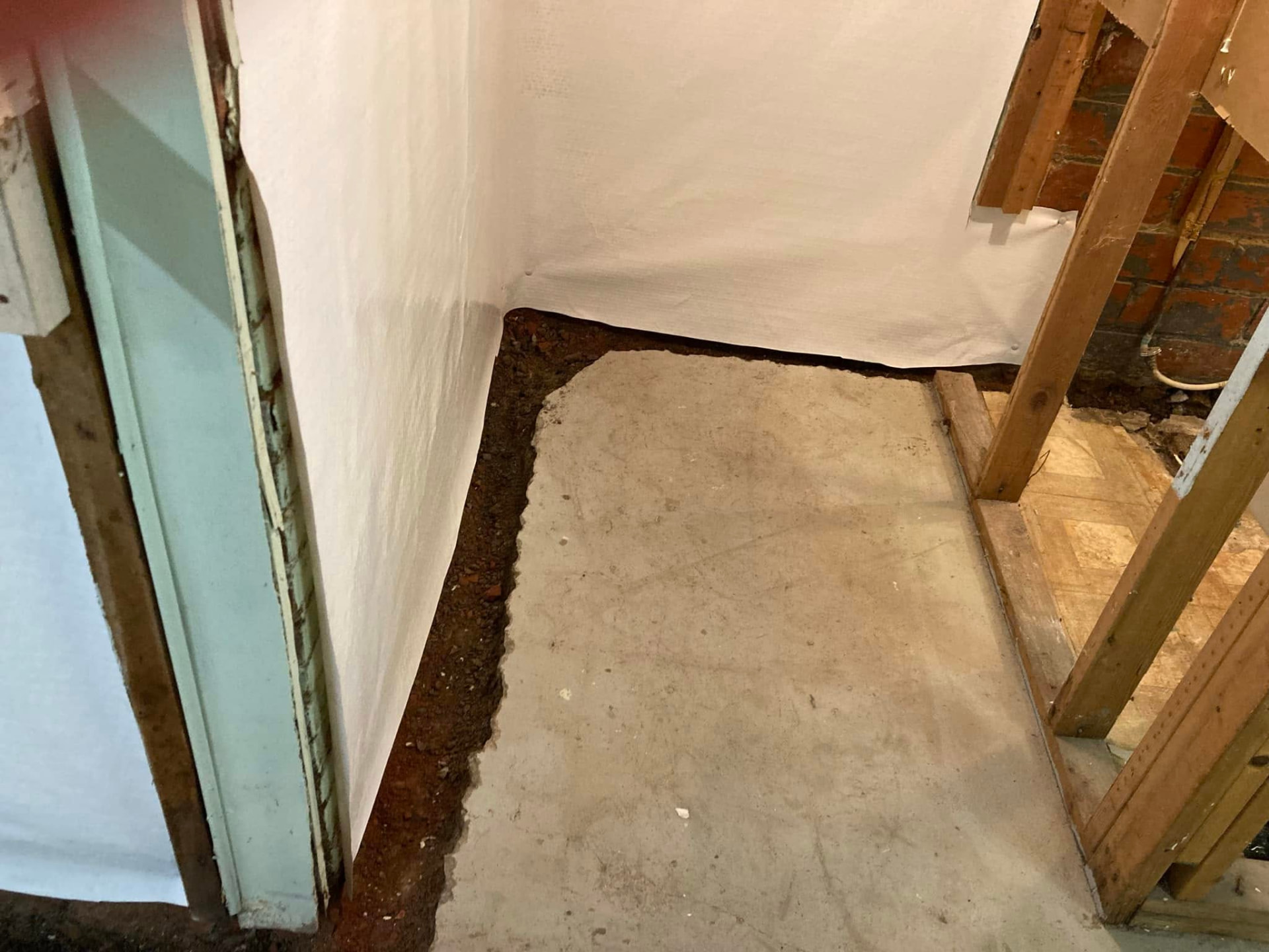 Basement wall waterproofing membrane installation