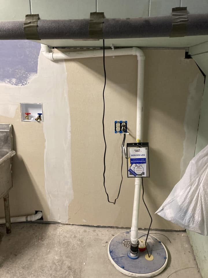 Sump pump installation and basement drywall repair